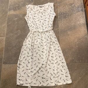 White vintage dress. Size small. With a tie